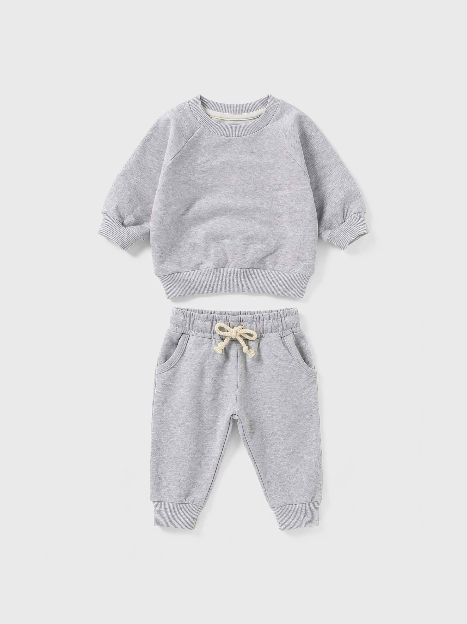 Gray children's sweatshirt and pants set on a white background